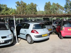 Le Car parked at the beach